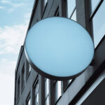 blank-round-sign-board-building