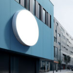 circular-blank-billboard-attached-wall-building